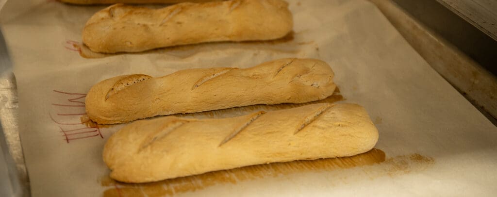 Students in Benedictine High School's Culinary Club participating in a cooking session.